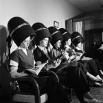 charles-steinheimer-women-aviation-workers-under-hair-dryers-in-beauty-salon-north-american-aviations-woodworth-plant